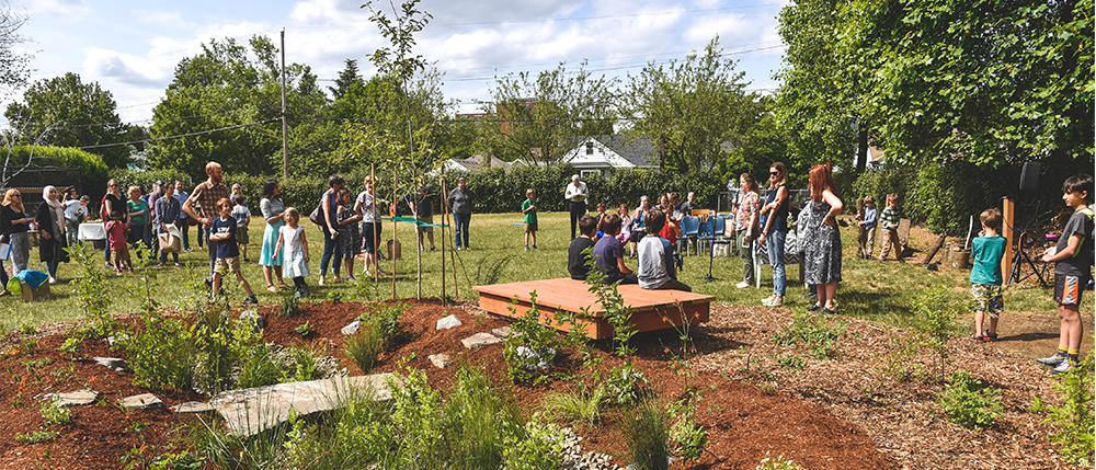 Parents and children enjoying The Portland Montessori School playground